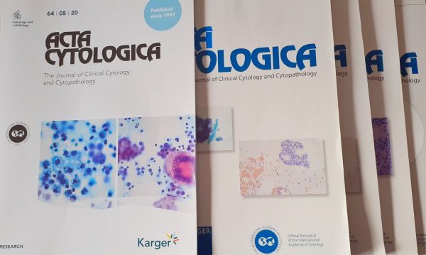 Image of several issues of ACTA Cytologica